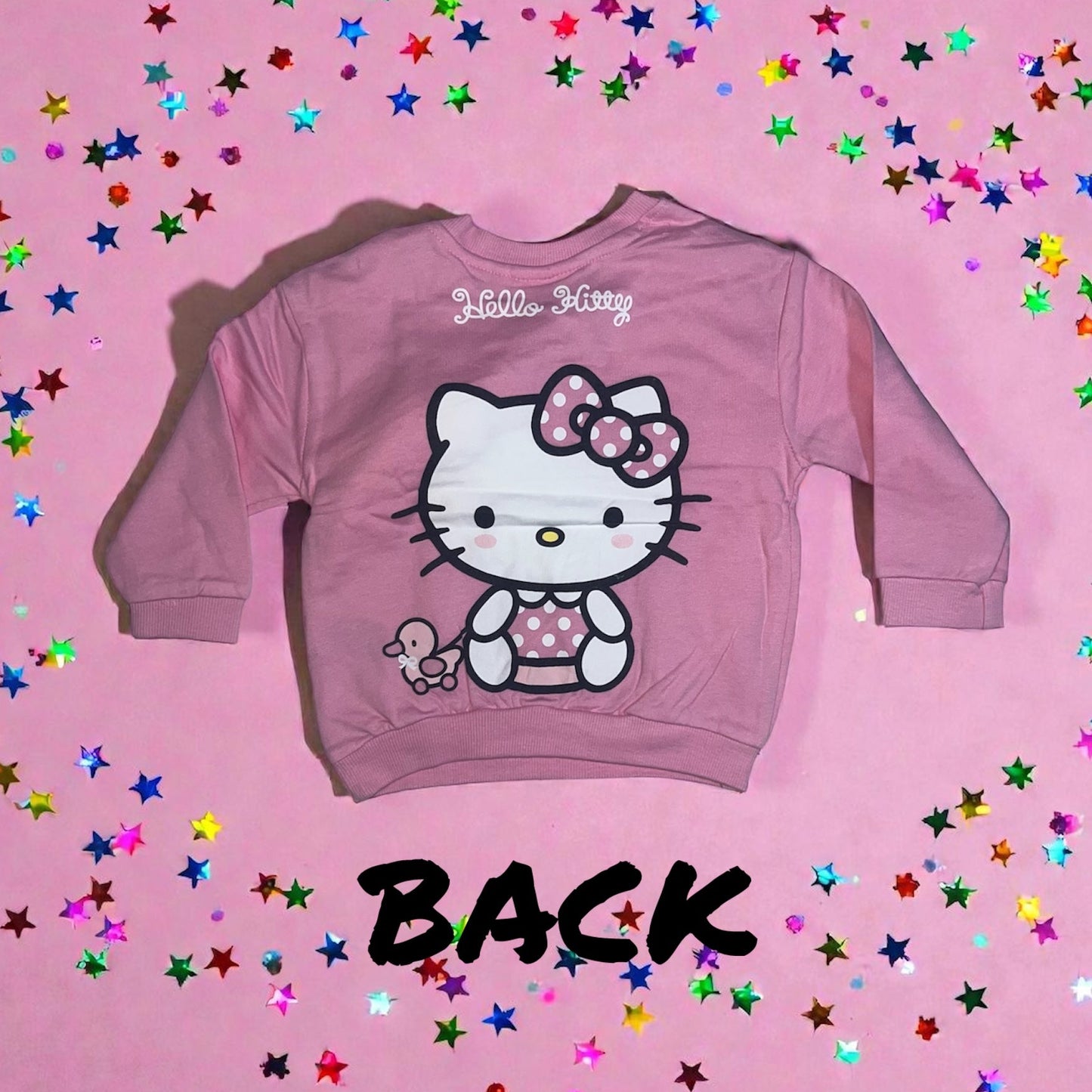 Pink Hello Kitty kids sweatshirt from Aatiyas Fashion on a pink background with colorful stars